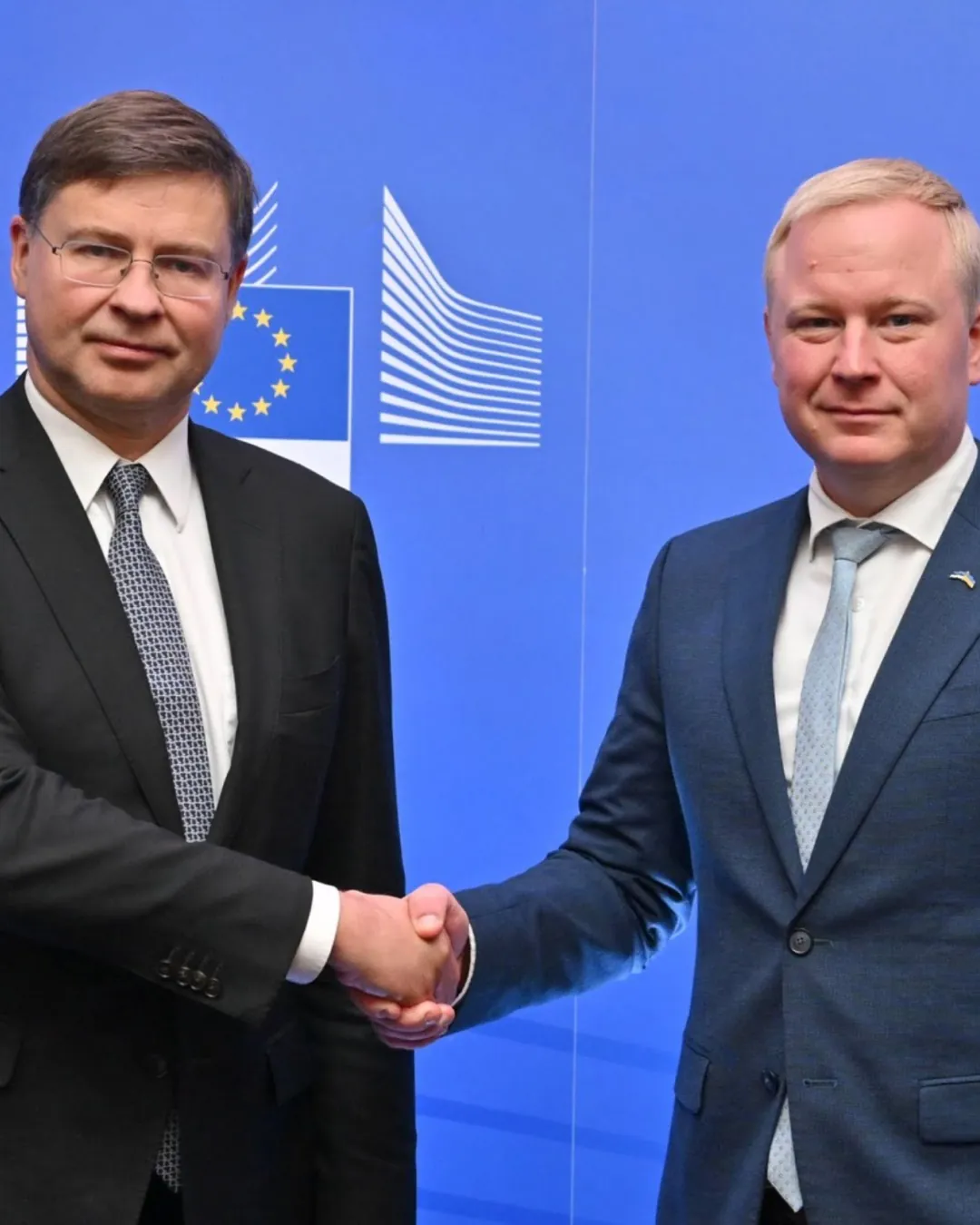 Earlier social media post: a handshake photo in front of EU flags